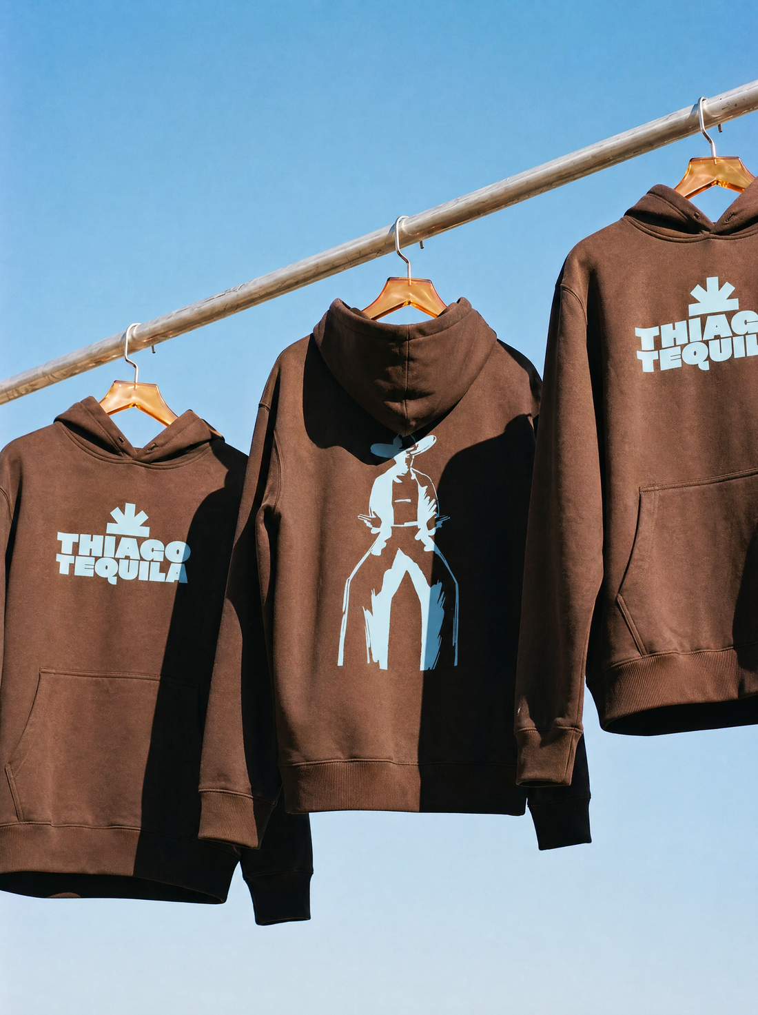 Brown Hoodie – Ice Blue Gunslinger
